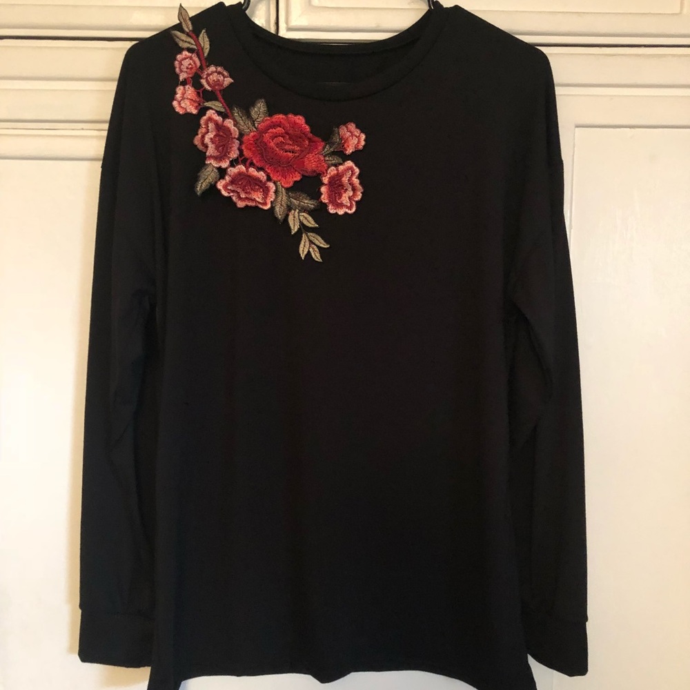 Long sleeve black shirt with floral overlay